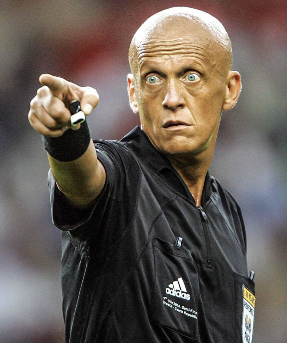 Footballtweet's tweet photo. The most iconic referee of all time. 👊 https://t.co/Vd9x9O4LcF