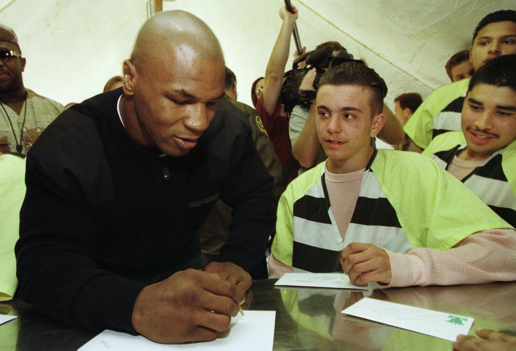 Mike Tyson signs autographs at the Maricopa County