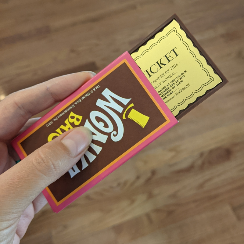 Wiggles3DGames's tweet photo. I LOVE the #BoardGameComponents in #TheGoldenTicketGame The chocolate bar component with the secret golden tickets is not only so beautiful but also really satisfying. It makes for a great #familygame.
#BoardGame https://t.co/DjOdkuAm4a