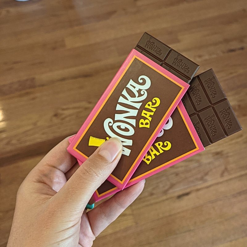 Wiggles3DGames's tweet photo. I LOVE the #BoardGameComponents in #TheGoldenTicketGame The chocolate bar component with the secret golden tickets is not only so beautiful but also really satisfying. It makes for a great #familygame.
#BoardGame https://t.co/DjOdkuAm4a