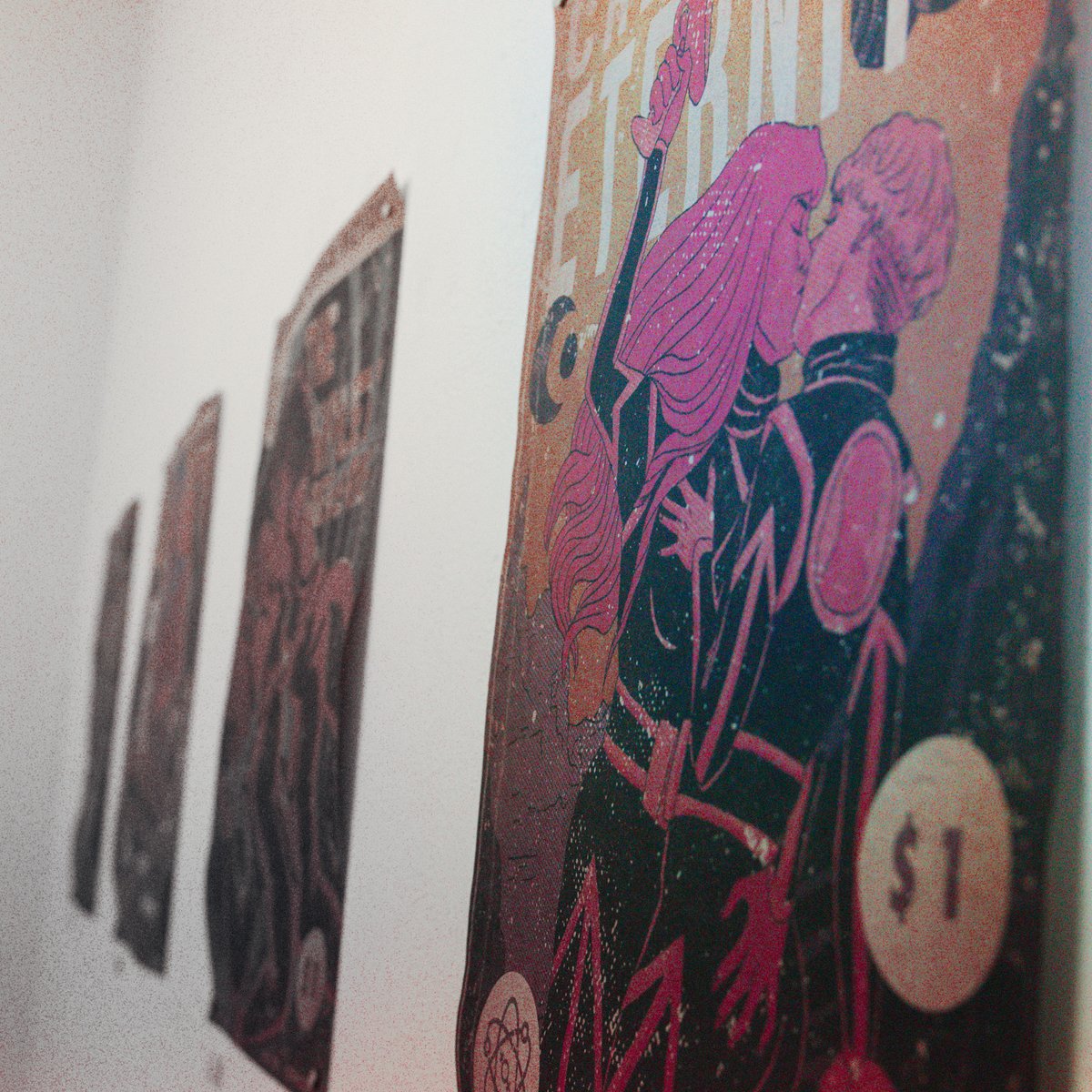 This month in our Groundworks Gallery we are hosting Sapphic Science Fiction with works by Ann Drew (She/Her/They, IG: sapphic_scify_comics). Come enjoy this solo exhibit with works that combine queer and lesbian love stories with a pulp science fiction aesthetic!