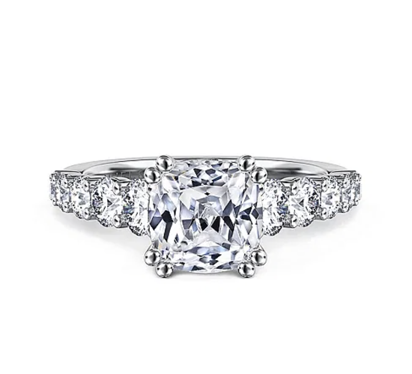 Cushion cut engagement rings get their name from their shape, which features rounded corners for an overall softer look and glow. The design is an appealing alternative to standard engagement ring cuts, which may feel too austere for some people.

gabrielny.com/14k-white-gold…
