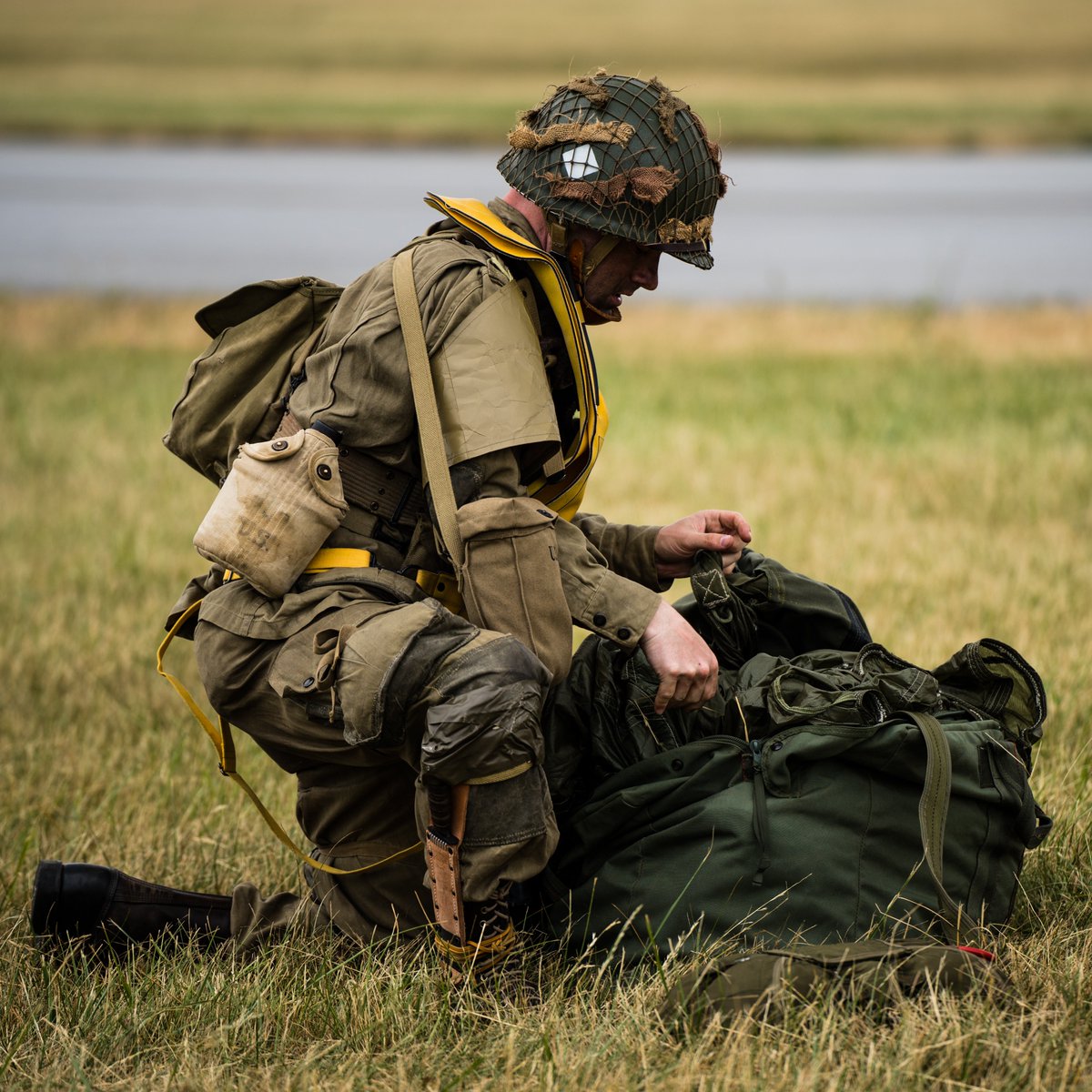 AndrewBashore's tweet photo. Continuing to work through my photos from #wwiiweekend. This one is during an after a jump from the WWII Airborne Demonstration Team. https://t.co/CFA9I5ydYo