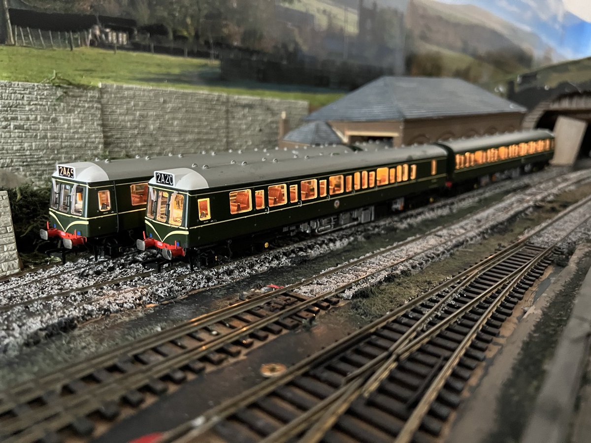 2 x 2 Car DMUs at Tetbury awaiting cleaning before their next trips to Kemble. Based of course on the concept that Tetbury had not closed!