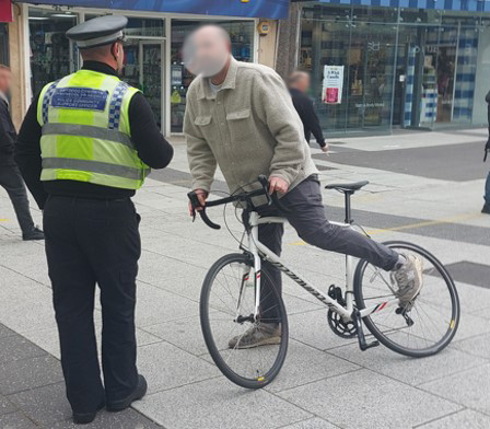 cardiffcouncil's tweet photo. Our City Centre Warden's teamed up with @SWPCardiff to enforce the no-cycling rule along Queen Street.

Since April, #OpCastor has seen:

✅Over 650 cyclists stopped
✅119 stolen OvoBikes seized
✅43 fixed penalty notices issued
✅3 Sec 59's issued to electric scooter riders https://t.co/ydwgXuLuql