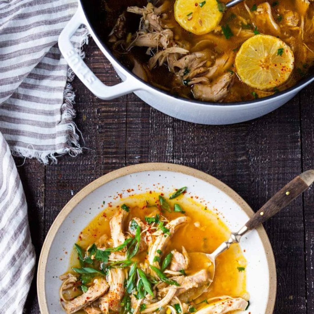 𝐅e𝐚s𝐭i𝐧g a𝐭 𝐡o𝐦e d𝐮r𝐢n𝐠 𝐭h𝐢s c𝐨l𝐝 𝐰i𝐧t𝐞r! This recipe for Feel Better Chicken Soup with Lemon and Ginger will warm you to your bones!  Photo &amp; Recipe Credit by @sylviafountaine  Follow #komatifruit on Instagram for the link to the full recipe.