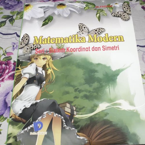 TouhouHijackLOL's tweet photo. An Indonesian math book covering coordinate systems and symmetry contains artwork of Marisa Kirisame on the cover. https://t.co/hTxDtGtQdL