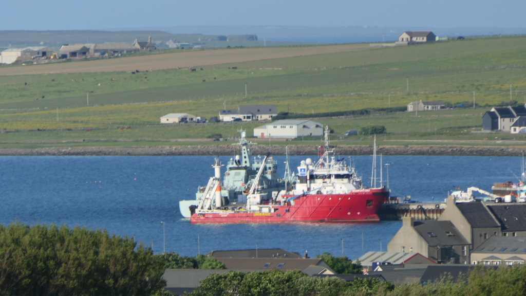 LizLovick's tweet photo. The harbour from a dog walk. The red boat is an off-shore fireboat. Behind it is one of the fisheries protection vessels which mooches around the north east Atlantic. Both are regular visitors, taking on supplies etc.
#orkney #orkneylife #islandlife #kirkwall #countrysid… https://t.co/Vlycgl6X2u