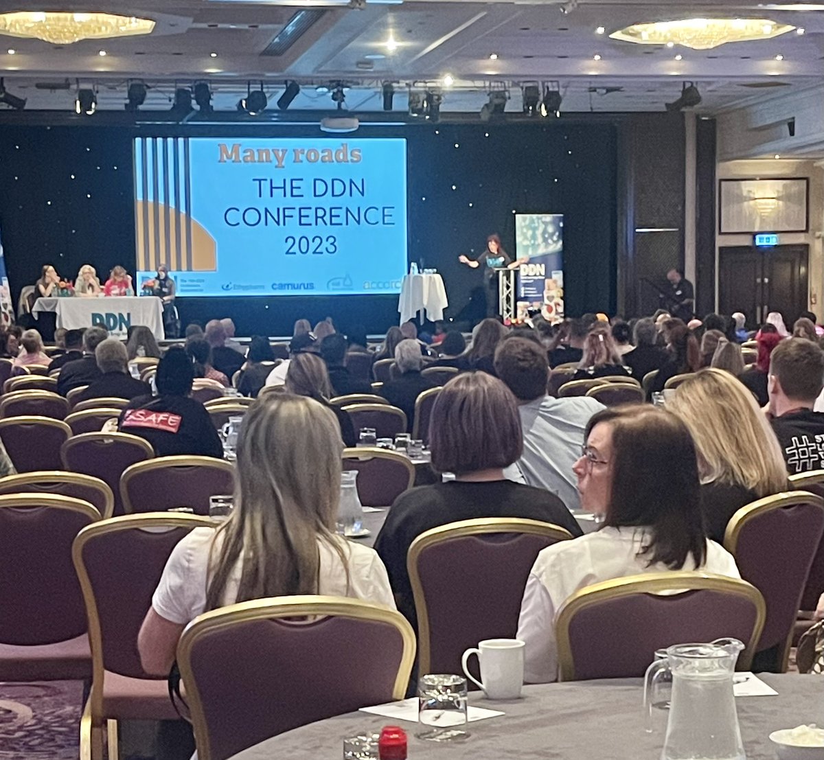 StaceyInspire's tweet photo. Here’s Claire Brown kicking off the day #DDNConf #ManyRoads https://t.co/t0N6UumIrE
