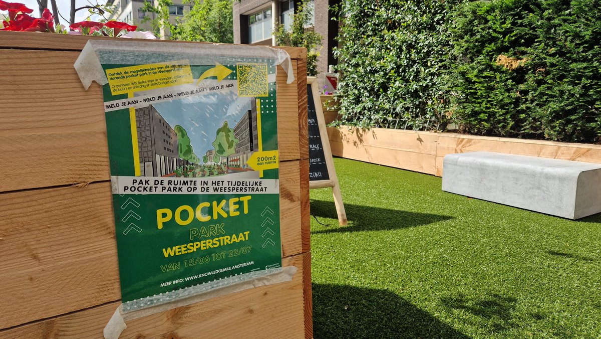 LiorSteinberg's tweet photo. Meanwhile in #Amsterdam, people are enjoying the new pop-up pocket park created in what used to be a busy road. A group of neighbors is meeting to form a new "green working group." https://t.co/6pkRhQNVWY