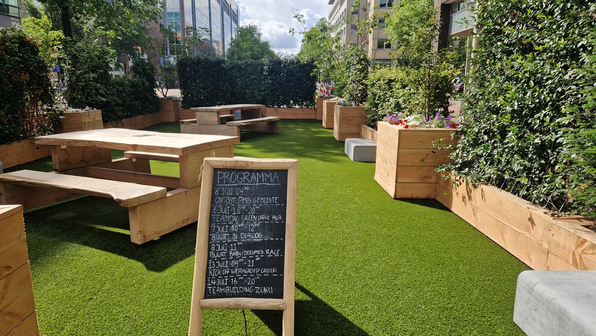 LiorSteinberg's tweet photo. Meanwhile in #Amsterdam, people are enjoying the new pop-up pocket park created in what used to be a busy road. A group of neighbors is meeting to form a new "green working group." https://t.co/6pkRhQNVWY