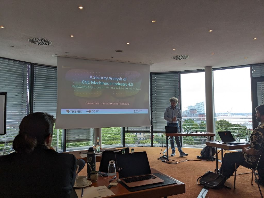DIMVAConf's tweet photo. #DIMVA Session 4 on Security and the physical world with talks from Alessandro Erba on attacks against anomaly detectors and from Marco Balduzzi on the security analysis of CNC machines in Industry 4.0. https://t.co/adpS2MxscH