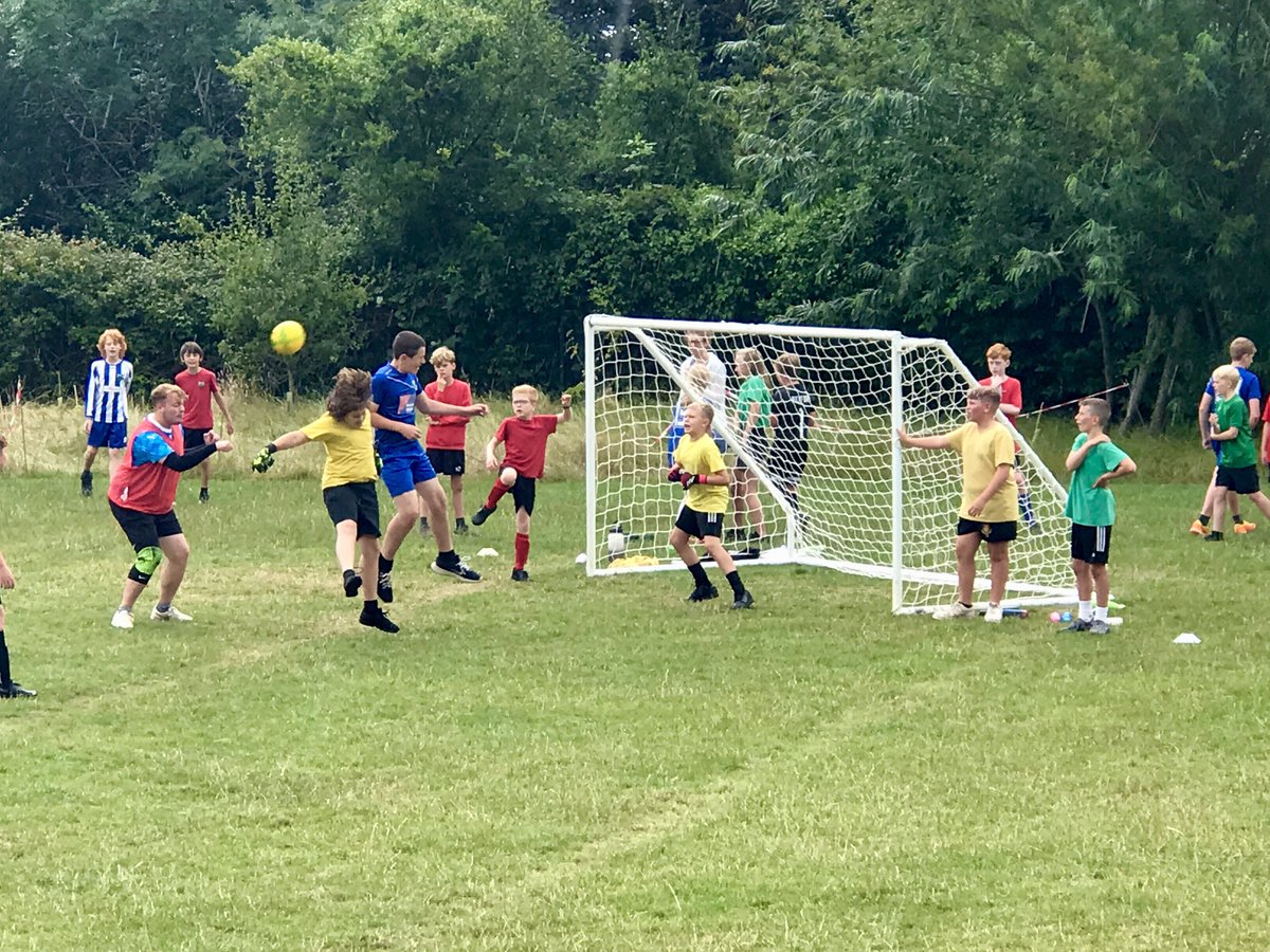 thedellschool's tweet photo. Action on the football pitch today in our annual Staff v Year 6 match. Another lovely whole school event for players and crowd alike. #healthyconfidentindividuals https://t.co/oeSg5sz75B