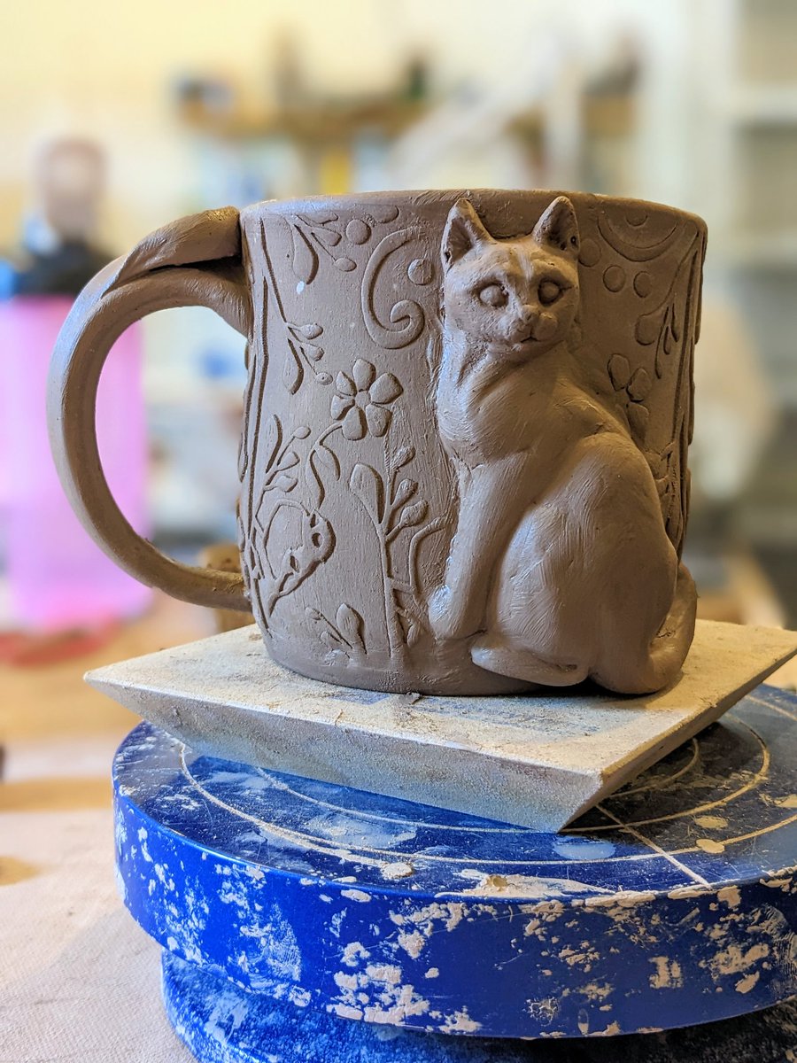 Meow. When you are watching congregational hearings, best to drink out of a joyful cup. #meow #coffeecup #teamug #handmade #pottery #ArtistOnTwitter