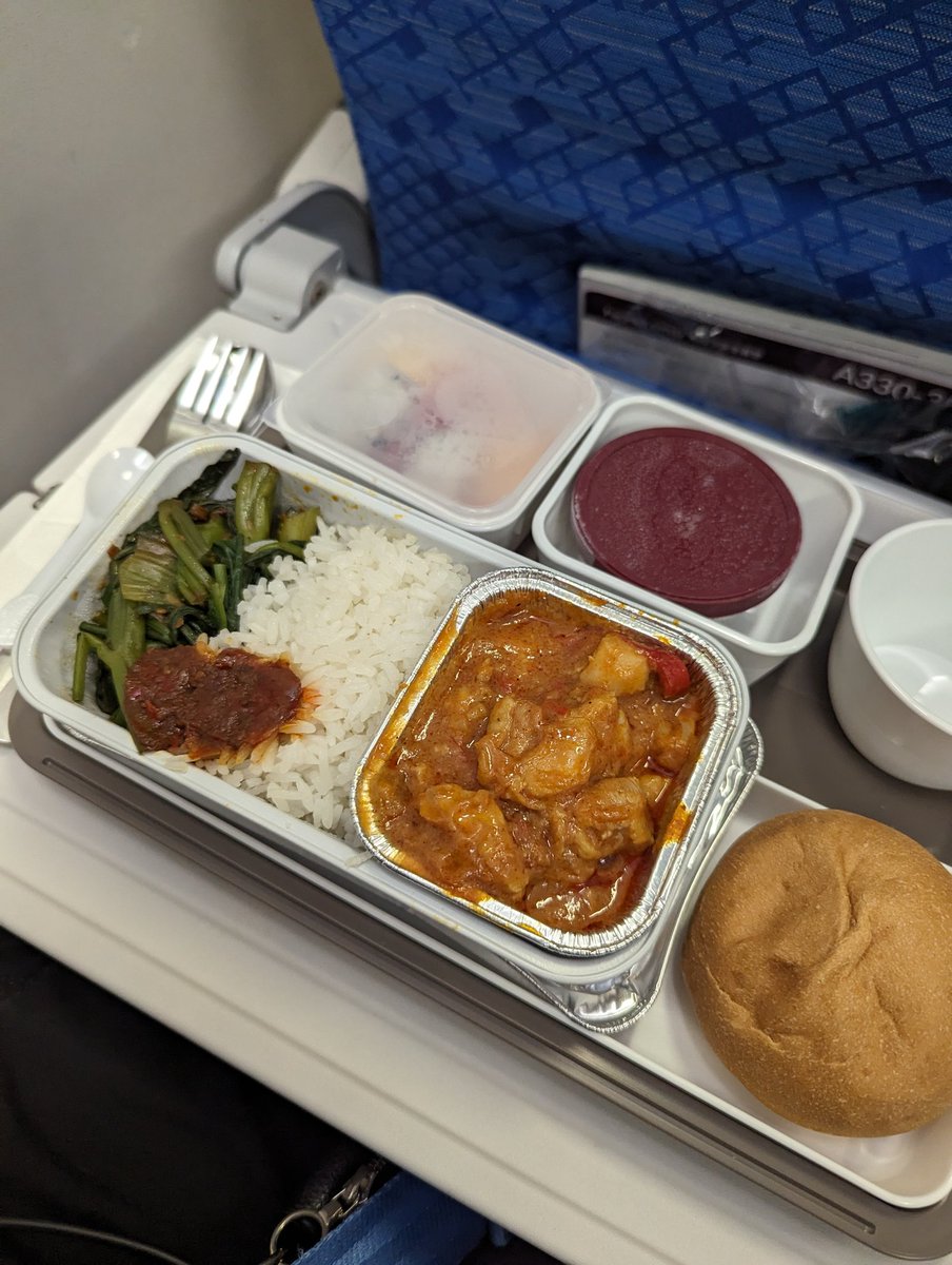 jaredadler's tweet photo. PEN-HKG on Cathay, this chicken curry and greens sauteed in shrimp paste is the best economy class meal I've ever have at least that I can remember https://t.co/0ljEKPNzDM