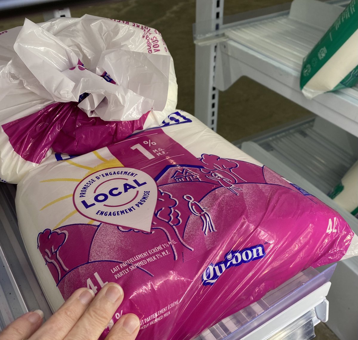 DRaises's tweet photo. Buying milk in a bag is a thing in this part of Canada. I can’t wrap my head around why this would be a thing!? Less packaging? Going down the rabbit hole to learn more. #Canada #Milk #Travel https://t.co/7Xoe4VRg2H