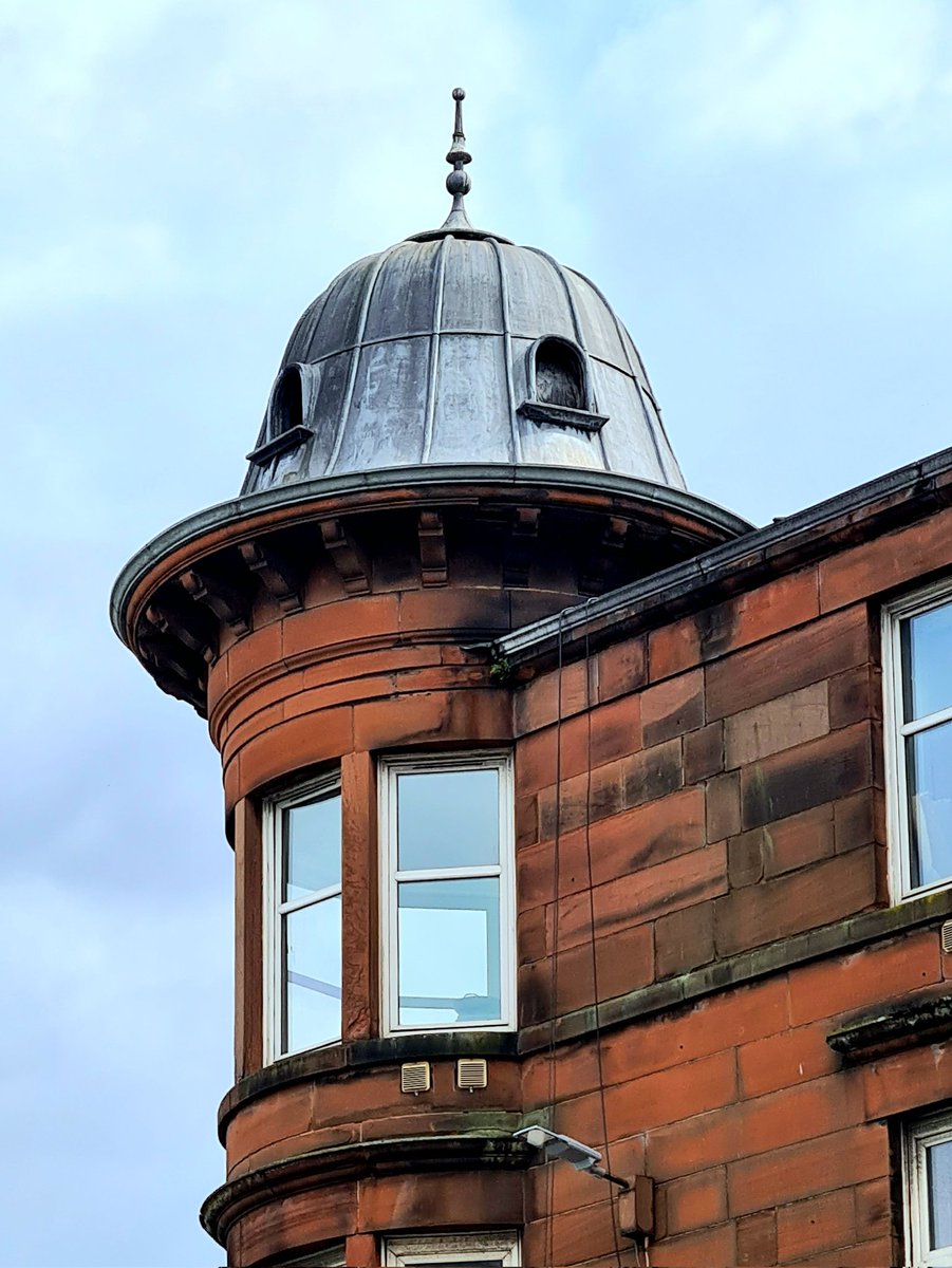 A wonderful circular corner bay window topped by a rather striking Glasgow Style metal cupola and finial on Alexandra Parade in the east end of Glasgow.

#glasgow #architecture #glasgowarchitecture #glasgowbuildings #alexandraparade #cupola #baywindow #cornerwindow #glasgowstyle