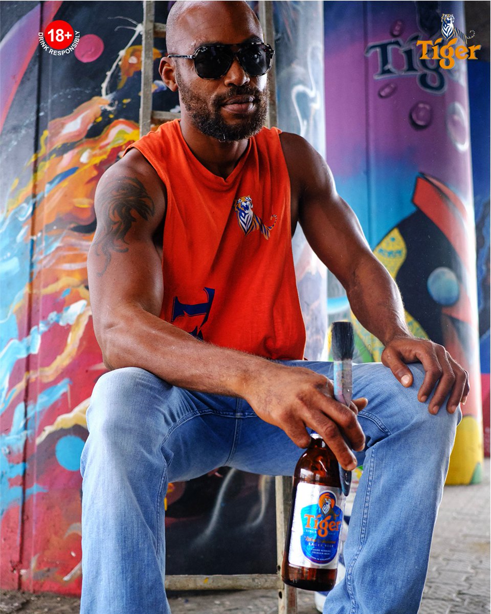 tigerbeer_ng's tweet photo. Uncaged tigers and uncapped colours… say less! @the_flying_bushman we don’t know which piece we love more, Naija what do you say? #TigerBeerXOzumbaMbadiwe. #LiveUncaged #AlwaysBoldAlwaysRefreshing https://t.co/3eRs92v1PP