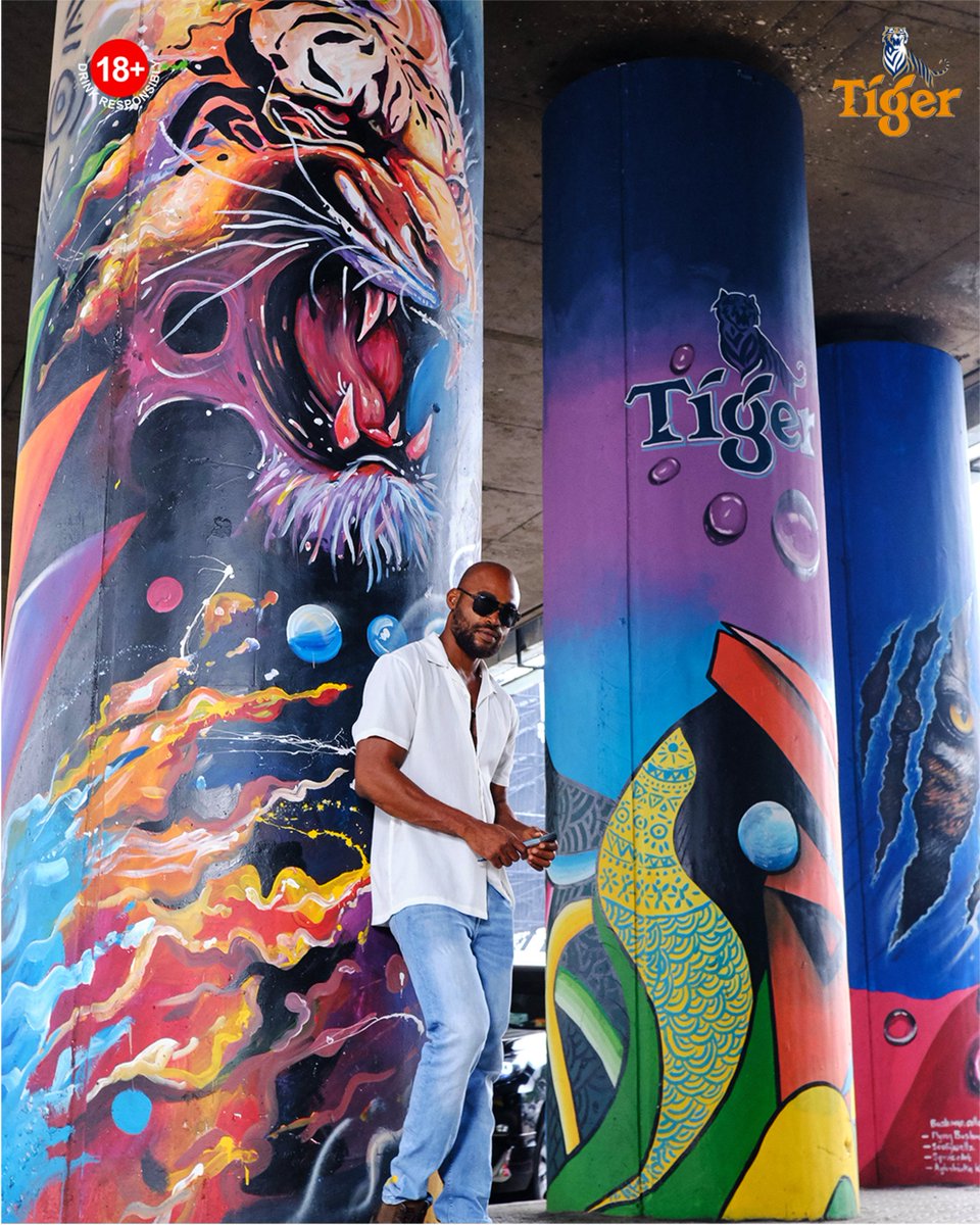 tigerbeer_ng's tweet photo. Uncaged tigers and uncapped colours… say less! @the_flying_bushman we don’t know which piece we love more, Naija what do you say? #TigerBeerXOzumbaMbadiwe. #LiveUncaged #AlwaysBoldAlwaysRefreshing https://t.co/3eRs92v1PP