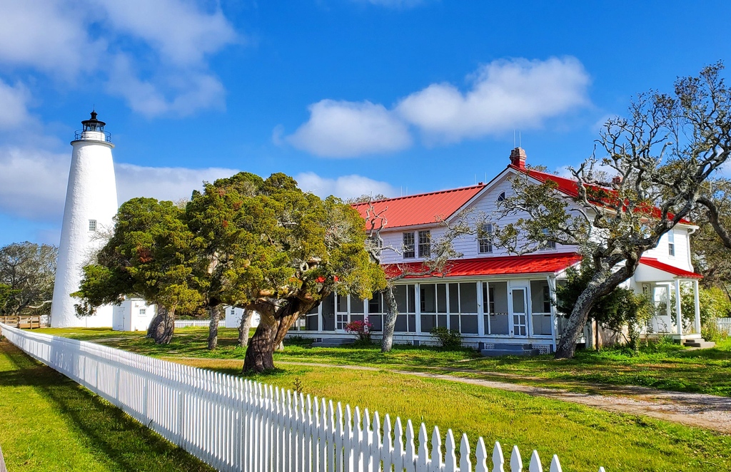 ocracokevillage's tweet photo. Tucked away on the isolated island of Ocracoke, Ocracoke's Lighthouse has been an essential beacon of light for over two centuries. Take a look at this iconic North Carolina treasure and plan a visit today! #OcracokeLighthouse #visitocracokenc #visitnc #outerbanks #obxlighthouse https://t.co/lZKIjHb5uO