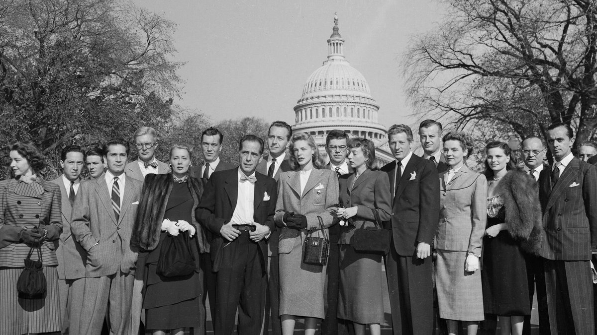 DADiClementi's tweet photo. Actors Humphrey Bogart, Lauren Bacall, Paul Henreid, Danny Kaye, Marsha Hunt, et al, on their way to protest HUAC. #SagAFTRA #UnionStrong #WritersStrike https://t.co/9kKA54Stc9