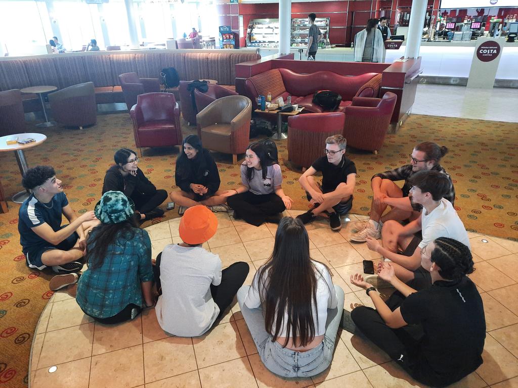Playing games on the ferry.
