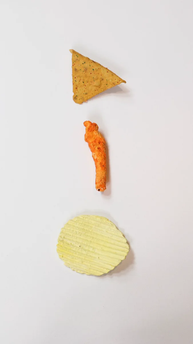 3D printed, hand-painted duplicates of Doritos, Cheetos, and Ruffles
