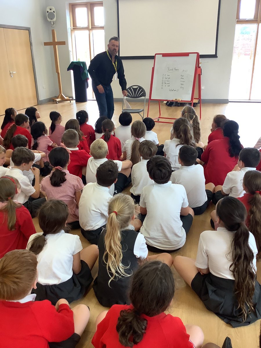 StPhilipsY5B's tweet photo. We enjoyed our visit from @Blandpoet 📚 ✏️ We got to write and perform our own puzzle poems! @StPhilipCEAP #teamstphilips https://t.co/ZQ9I46906i
