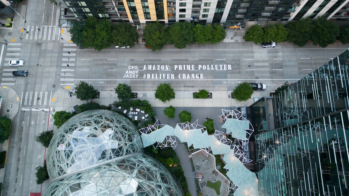 Climate leader? Try #Prime Polluter! Amazon walked back its already weak climate commitments. Check out this message to <a href="/ajassy/">Andy Jassy</a> that <a href="/standearth/">Stand.earth</a> painted at their HQ in Seattle. Zero emission deliveries by 2030!  #DeliverChange