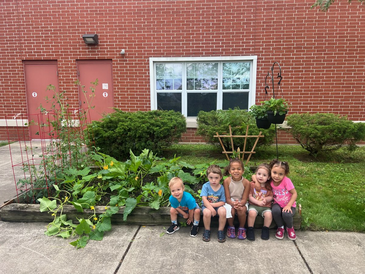 Look at these proud kiddos! The hard work they have been putting into their #garden has been flourishing into a harvest of tomatoes, zucchini, cucumbers, strawberries &amp; green beans. We can't wait to continue this journey, sharing the joys of gardening with everyone involved!