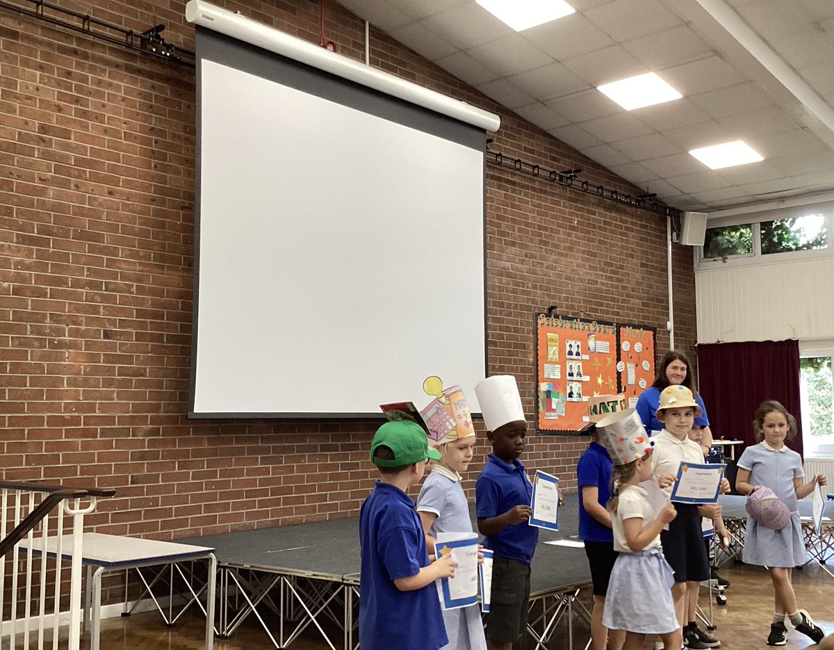 Celebrating our thinking hats in assembly for #PotterStreetMathsDay