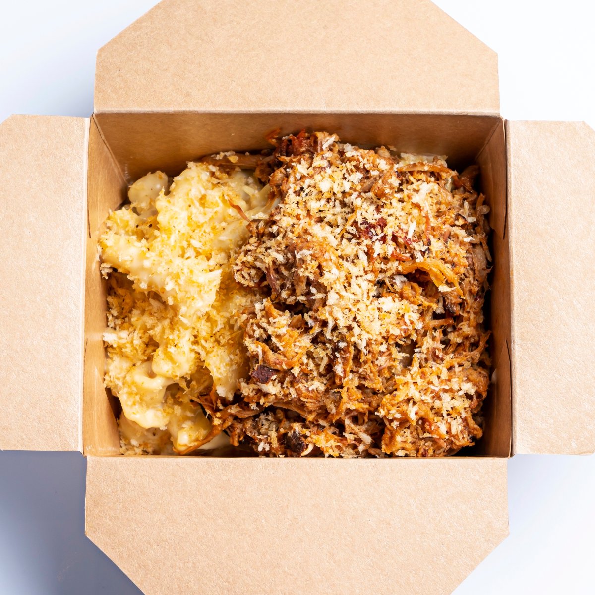 Run - don't walk! - to order our Loaded Macs @lefantomeriverdale!

Creamy mac &amp; cheese piled high with your choice of Carolina Pulled Pork, Texas Brisket, or our vegan Quinoa Crumbles😋

Check out our exclusive menu thru the link in our bio!