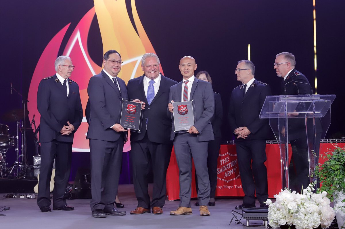 The Honourable Doug Ford, Premier of Ontario, presents Jake Tran, president and CEO and  CFO, Raymond Lam of the Toronto Grace Health Centre with TSA’s Covid-19 Award of Excellence at a Gala Awards dinner.<a href="/fordnation/">Doug Ford</a> <a href="/Salvationist/">Salvationist.ca</a> @GeneralBPeddle