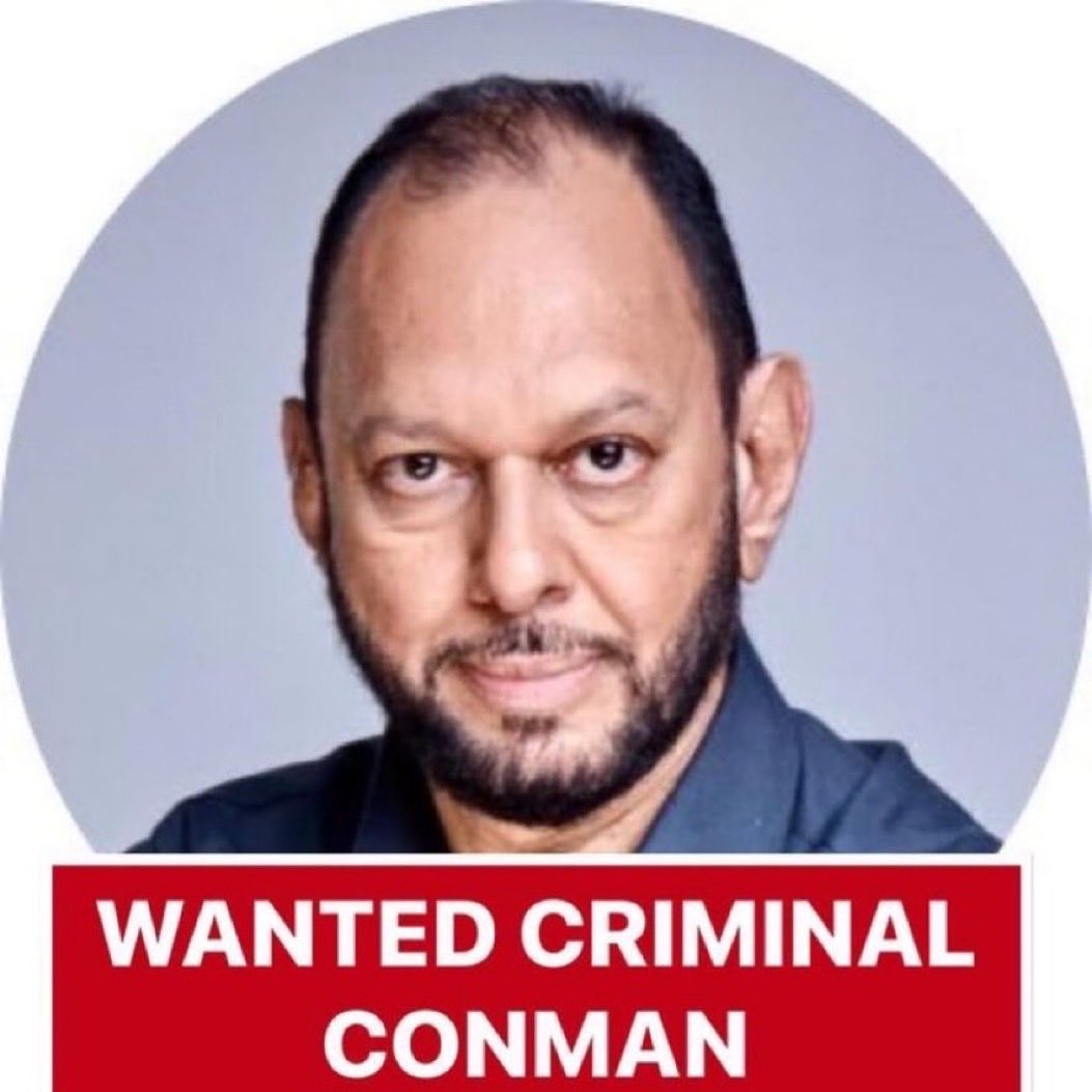 <a href="/StopSkyfCap/">Stop Skyf Capture</a> <a href="/SimonRudland/">Simon Rudland</a> <a href="/BATplc/">BAT</a> <a href="/SAPoliceService/">SA Police Service 🇿🇦</a> <a href="/IllicitCig/">Illicit Cigarettes</a> 
<a href="/TaxJustice_SA/">Tax Justice South Africa</a> <a href="/eNCA/">eNCA</a> 
WANTED CRIMINAL         CONMAN
LARGE REWARD OFFERED 
LAST SEEN CONNING PEOPLE ON CAMEL IN SAUDI ARABIA. 
LAST PLACE OF WORK BATplc. APARTHEID SPY
HAVE YOU SEEN THIS MAN?THE PUBLIC ARE WARNED NOT TO APPROACH