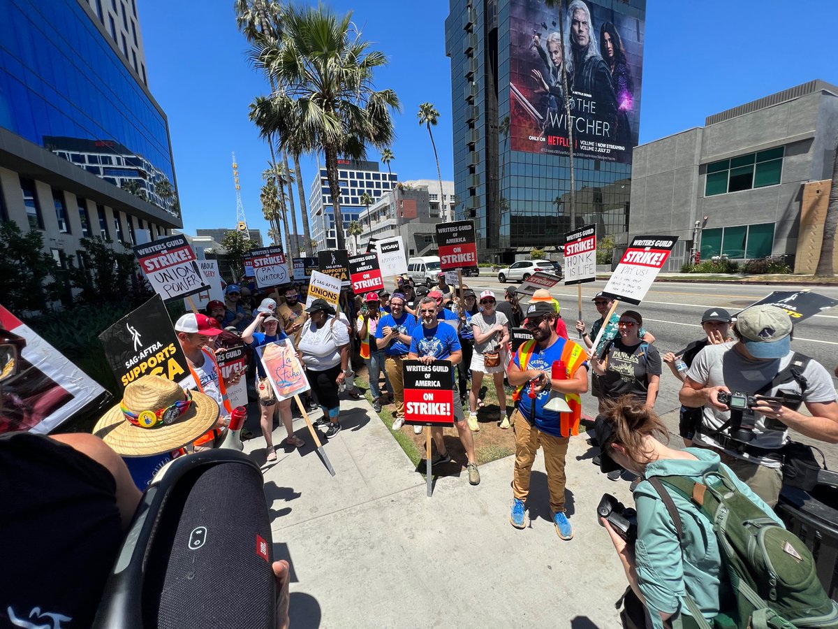 Writers and actors take a break from picketing at Netflix HQ to listen to the @sagaftra strike announcement and @frandrescher’s incredible speech. History in the making.