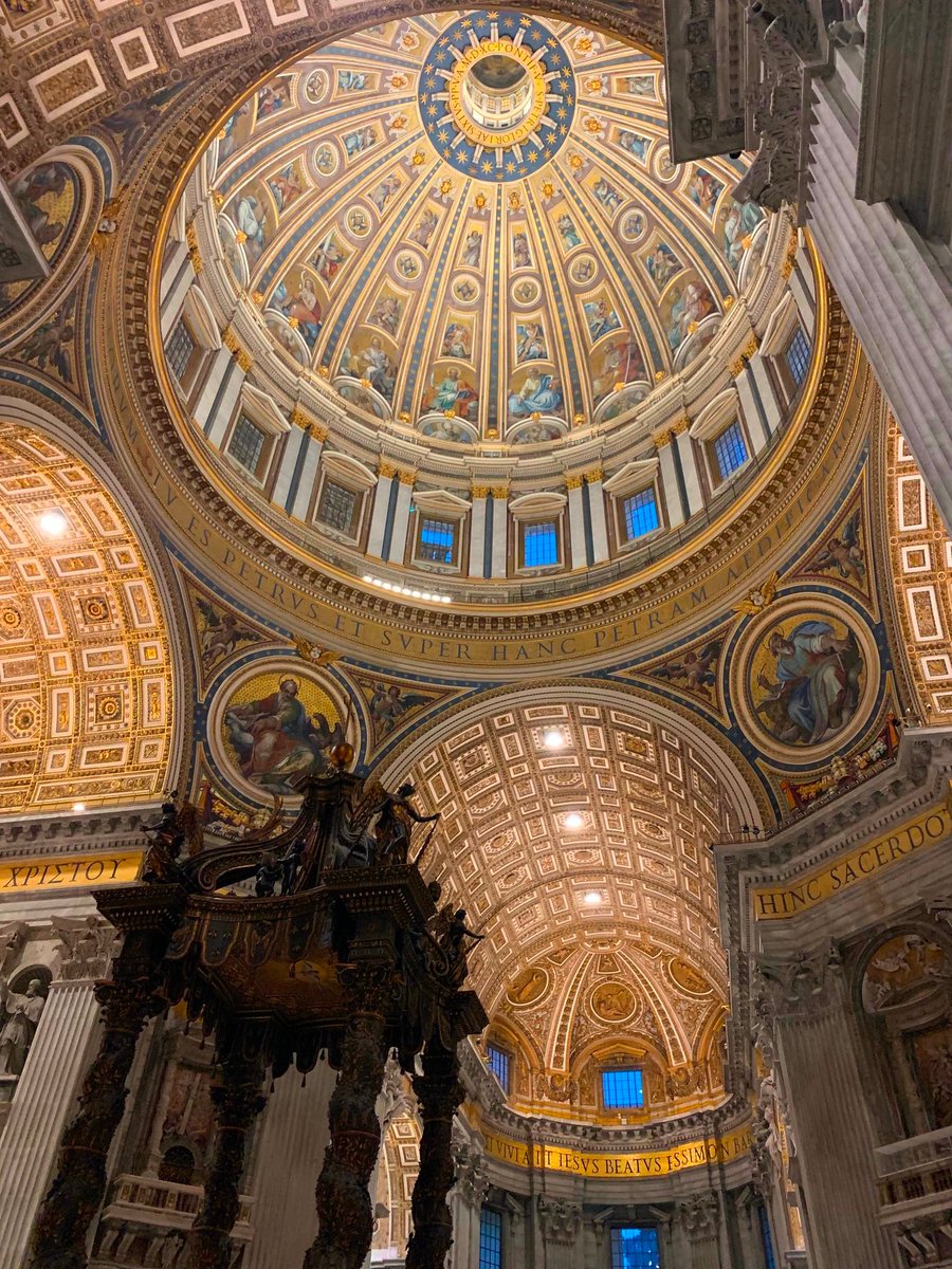 the_culturist_'s tweet photo. The people here indicate the unbelievable scale of St. Peter's.

Michelangelo's breathtaking dome is 447 feet tall - the letters around the base are themselves 2 meters tall, and read: "Thou art Peter, and upon this rock I will build my church. And I will give unto thee the keys of the kingdom of heaven."