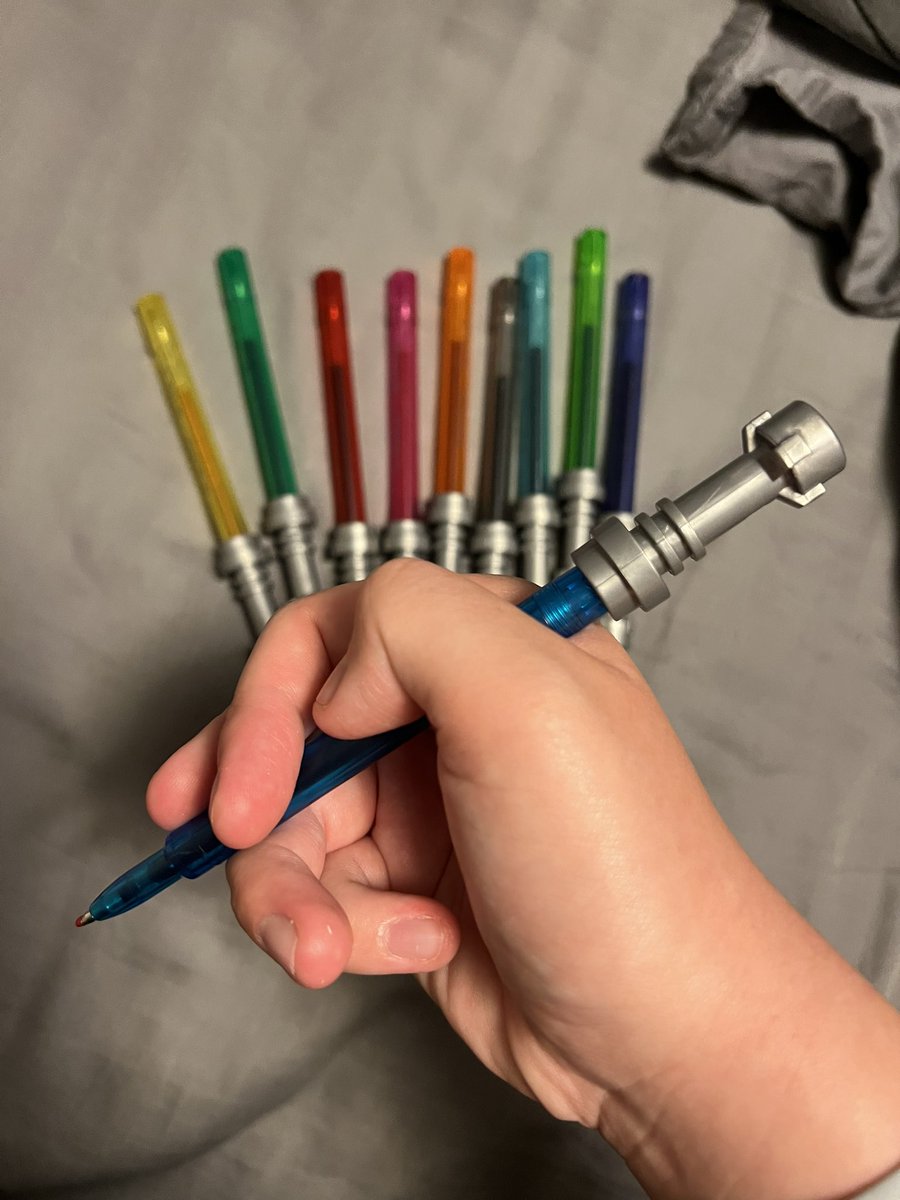 rotsoka's tweet photo. I AM OBSESSED WITH THESE LEGO LIGHTSABER PENS https://t.co/NT98ogU7ul
