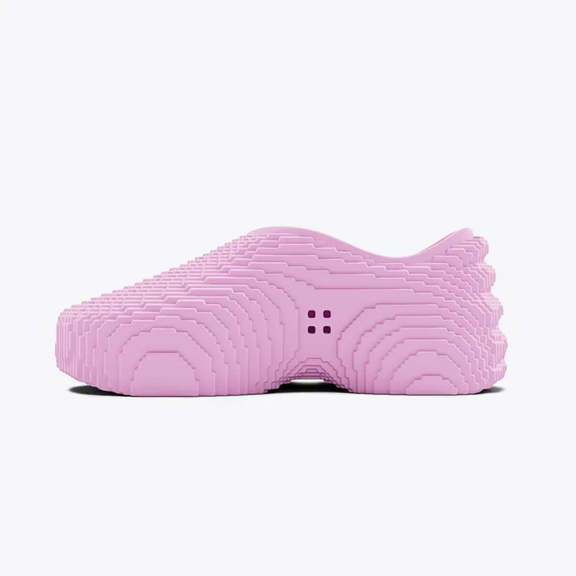 designboom's tweet photo. andrew kostman’s ultra-lightweight, pixelated sneakers capture the nostalgia of the 90s https://t.co/WIewh1CyLa https://t.co/FVdLnpMVF0