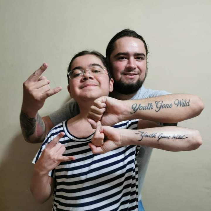 World Rock Day! 

Here I am with my brother, the one who inherited my taste for this musical genre
And by the way..... We Are The Youth Gone Wild! 

I have had this tattoo since I was 16 years old thanks to the one and only <a href="/sebastianbach/">Sebastian Bach™️</a> 

#WorldRockDay