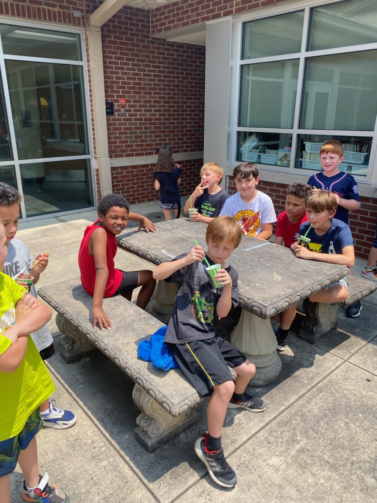 fmteducare's tweet photo. We enjoyed a cold treat on a hot day! 🖤💛 #SunsetSlush #ThanksMrDavid #ClassicItalianIce #Delicious #2023SummerEducare https://t.co/UQntVHlDwA