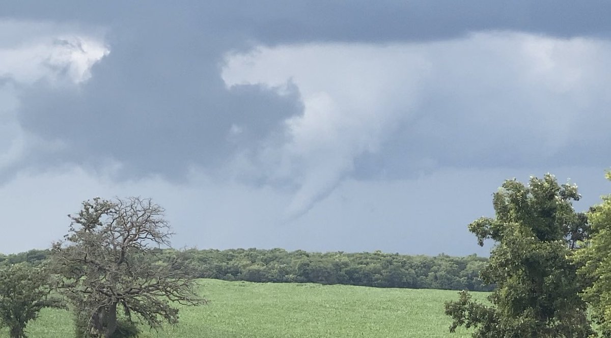 Probable tornado touchdown north of Clinton, WI around 6:25pm this evening. Funnel was most of the way to the ground a few minutes before this picture, but I was unable to get a photo as I was driving to get into position. <a href="/NWSMilwaukee/">NWS Milwaukee</a>