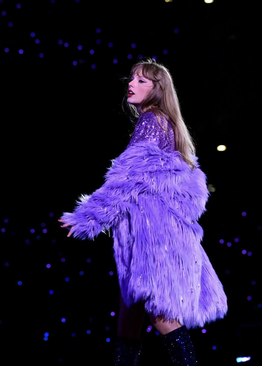 PopCrave's tweet image. Taylor Swift fan wears disguise on a local news station after revealing that she called in sick for work to attend the #ErasTour.