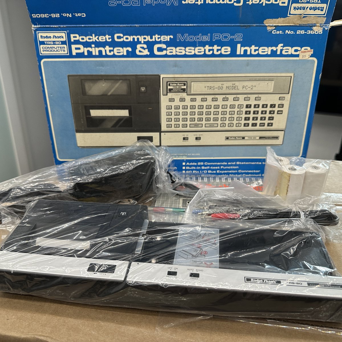 thevintnerd's tweet photo. eBay find: Was this TRS-80 PC-2 Printer &amp; Cassette Interface even EVER Used?! 🙀

#Tandy #RadioShack #TRS80 #PocketComputer #PC2 #Sharp1500 #PC1500 #VintageComputing #RetroComputers #RetroGaming #TheVintNerd https://t.co/KHf3OuSJG7