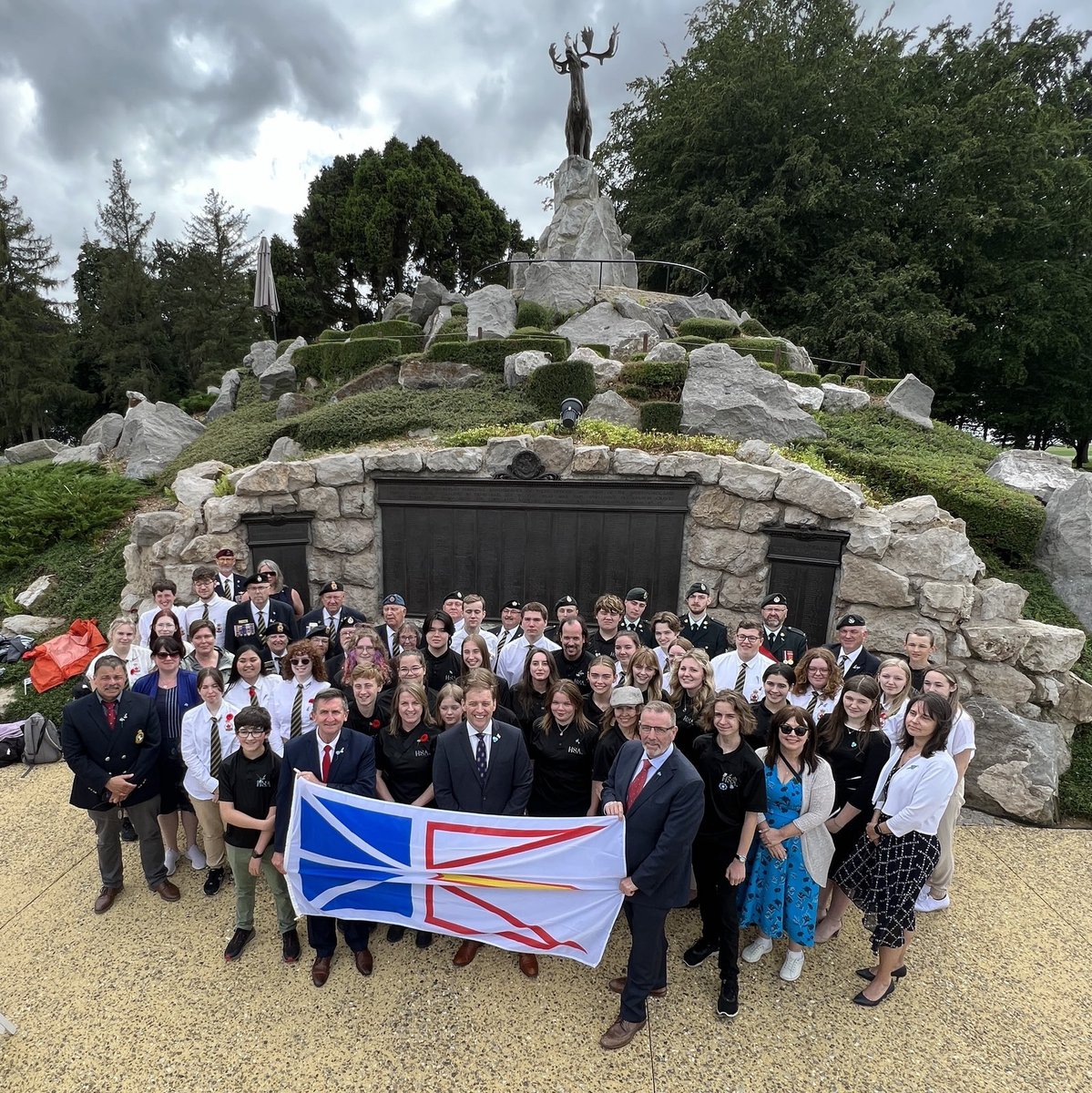 FureyAndrew's tweet photo. I was honoured to represent Newfoundland and Labrador at the Beaumont Hamel Memorial Day ceremony in France with so many others from home. A moving experience to hear and see the names of young soldiers who fought for our freedoms. #LestWeForget https://t.co/zysQ3sRCv5