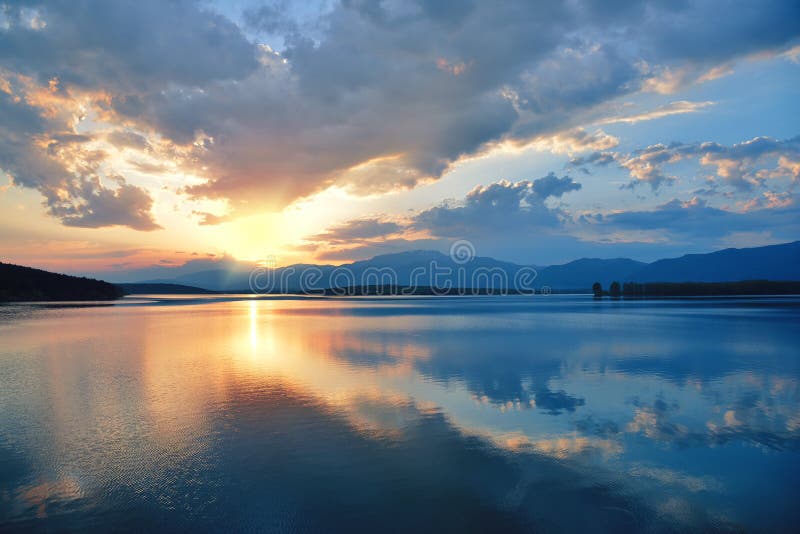 Sky became colourful by the #clouds &amp; #sunrays . The reflection of  Blue &amp; Yellow coloured sky in the water is looking so beautiful.