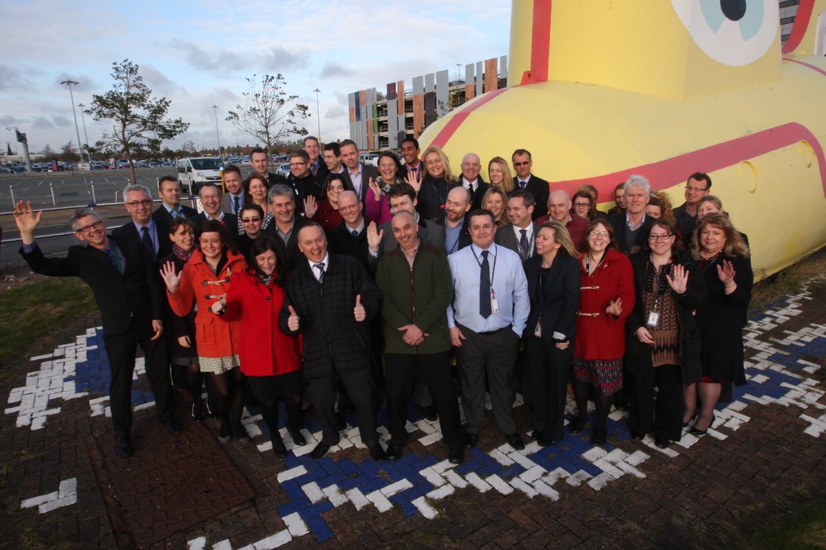 LPL_Airport's tweet photo. Airport staff get together by the Yellow Submarine on 14 February 2013 for this love-ly photo! 👋👍
#LPL90 https://t.co/DsvNGfdg3n