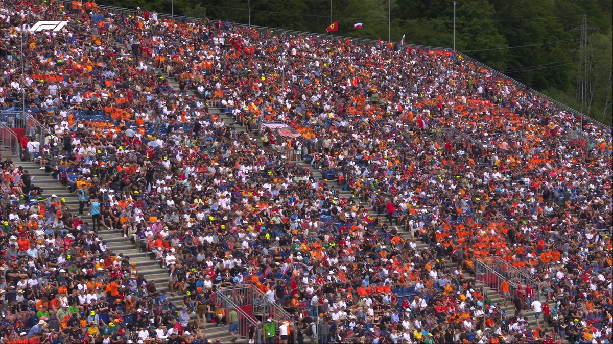 F1's tweet photo. Packed stands and lots of orange in sight! 🤗🙌

#AustrianGP #F1 https://t.co/2zeF94kMK7