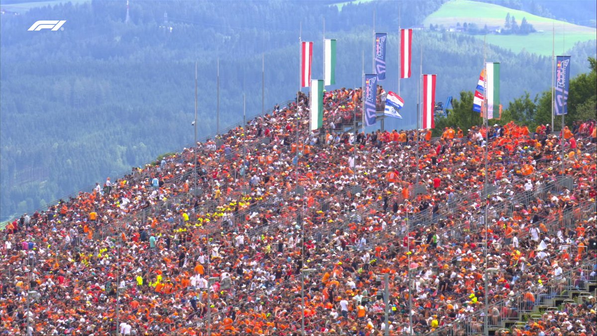 F1's tweet photo. Packed stands and lots of orange in sight! 🤗🙌

#AustrianGP #F1 https://t.co/2zeF94kMK7