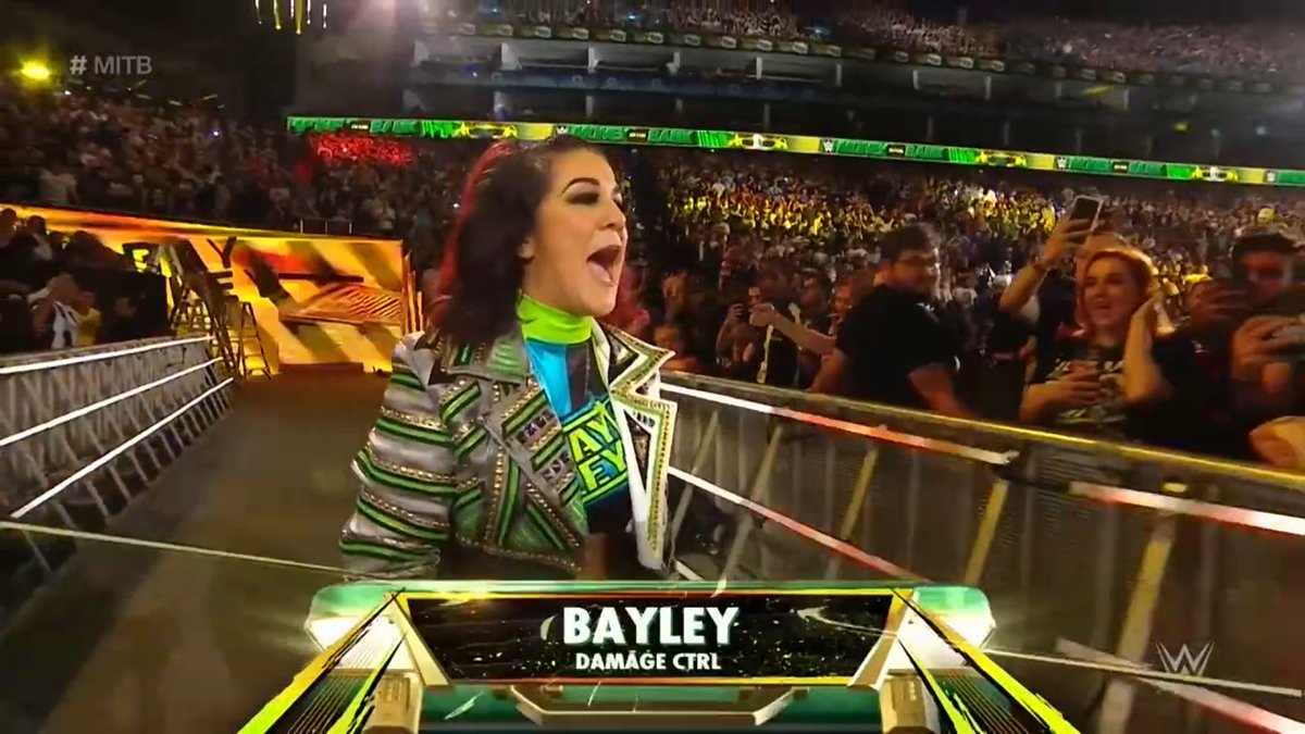 RingRustReviews's tweet image. Silly WWE Graphics team. It says that Bayley is part of Damage Control, when we all know (according to Samantha Irvin) that she is part of The Judgement Day! #WWEMITB #Spoilers #NeverLiveItDown