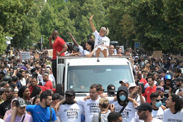 FrankDeScushin's tweet photo. Nahel Merzouk, whose death sparked France's riots, receives the full BLM martyr treatment. His mom rides atop his parade, but notice no father.

Nahel was known to police. He had 15 prior criminal incidents, including 5 refusing to comply which was what he was doing when shot. https://t.co/fS4PQOmC67